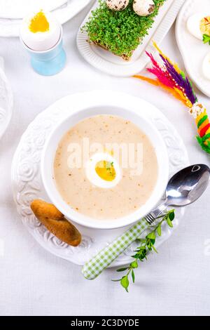 Easter in Polish: sour flour soup for Easter breakfast (Żurek) Stock Photo
