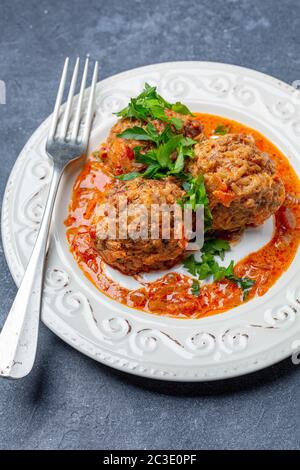 Delicious homemade meatballs in tomato sauce. Stock Photo