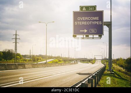 Traffic sign with text Do Not Go With The Flow. Appeal to noncoformism. Sunny positive atmosphere Stock Photo