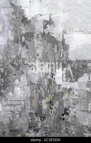Grunge Background with Old Torn Posters Stock Photo