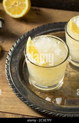 Boozy Lemon Whiskey Smash Cocktail Ready to Drink Stock Photo