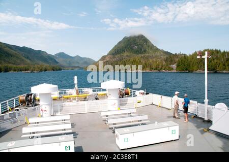 A BC ferry boat ploughing the Inside Passage route in the Pacific waters of the Great Bear Rainforest, near Klemtu, British Columbia, Canada. Stock Photo