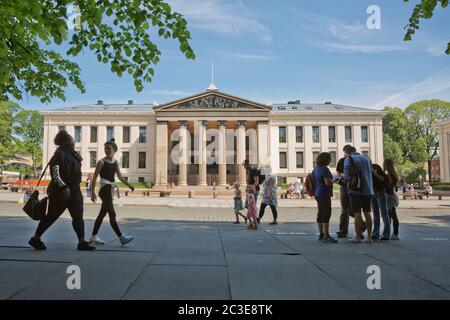 People walking in front of University of Oslo in Norway. Central campus, Faculty of Law Stock Photo