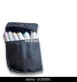 At close range white markers with colored tips in a black case on an isolated background. Copyspace Stock Photo