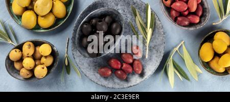 Olives overhead panorama. An assortment of green, black and brown olives, shot from above Stock Photo