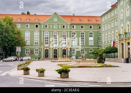 Green buildings of Stettin City Council with fountains and flower decoration Stock Photo