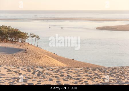 setting sun on the pillat dune in the Arcachon basin Stock Photo
