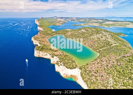 Telascica nature park cliffs and green Mir lake on Dugi Otok island aerial view Stock Photo