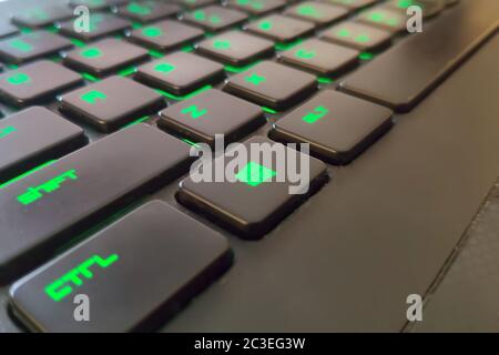 Moscow, Russia - June 04, 2019: green Windows button on a keyboard with lighting. Close up of shift, ctrl, alt Stock Photo