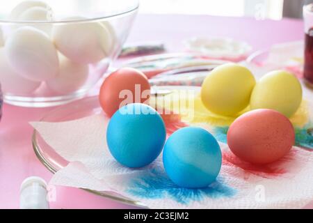 Painting in different colors of eggs for Easter Stock Photo