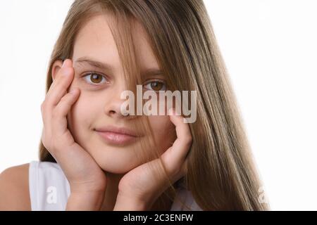 Portrait of a beautiful teenage girl, Caucasian appearance, with long brown hair Stock Photo