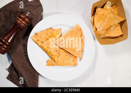 Mexican quesadilla on white plate. Stock Photo