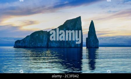 sunrise from a boat at leon dormido near san cristobal in the galapagos Stock Photo