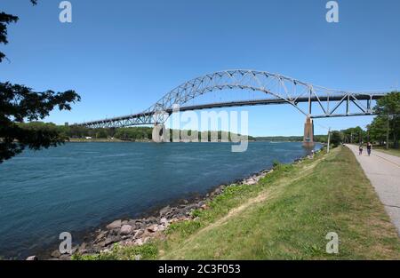 The Bourne Bridge (1935) which spans the Cape Cod Canal.  Slated for replacement. Bourne, Massachusetts, USA Stock Photo