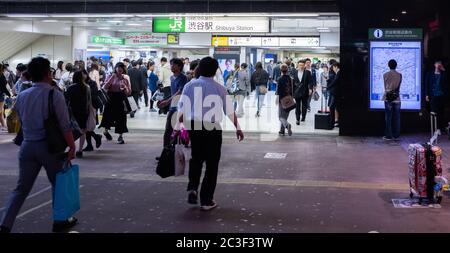 Commuter at Japan Railway Shibuya Station at night, Tokyo, Japan Stock Photo