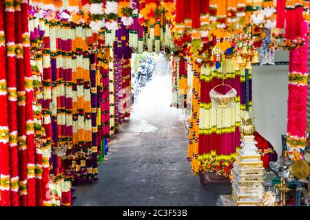 Indian garlands of colorful flowers for temple Stock Photo