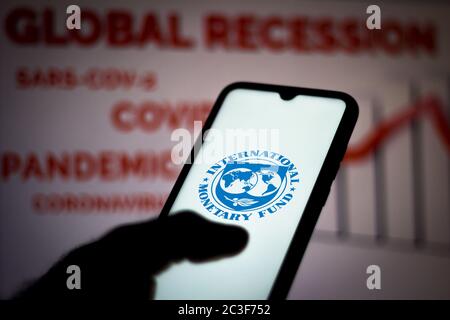 In this photo illustration the International Monetary Fund (IMF) logo seen displayed on a smartphone. Stock Photo