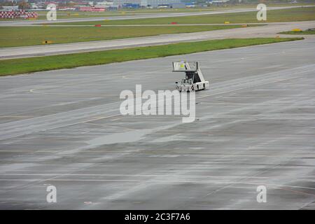 Airport movable ramp. Car ramps driving across the airfield Stock Photo ...