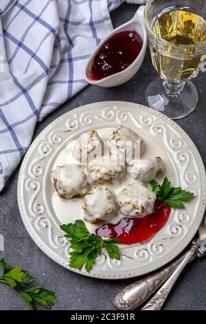 Traditional Swedish meatballs with cream sauce. Stock Photo