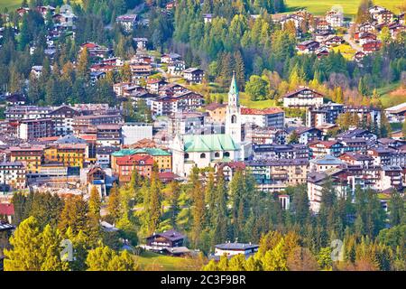 Town of Cortina d' Ampezzo in green landscape of Dolomites Alps Stock Photo