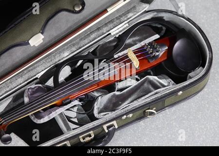 Electric violin in a case Stock Photo