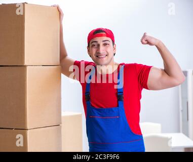 Contractor worker moving boxes during office move Stock Photo