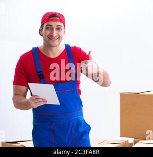 Contractor worker moving boxes during office move Stock Photo