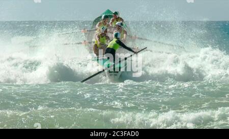 ALEXANDRA HEADLAND, QUEENSLAND, AUSTRALIA- APRIL 24, 2016: the view from the beach of a surf boat race Stock Photo