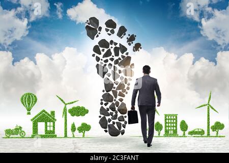 Carbon footprint concept with businessman Stock Photo