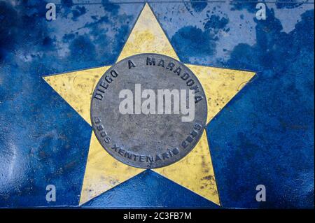 Buenos Aires city street view, Caminito, La Boca, Argentina, Boca Juniors, Diego Armando Maradona's star at  the street outside La Bombonera Stadium Stock Photo