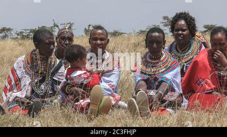 MASAI MARA, KENYA- SEPTEMBER, 26, 2016: maasai women at koiyaki guiding school graduation day in kenya Stock Photo