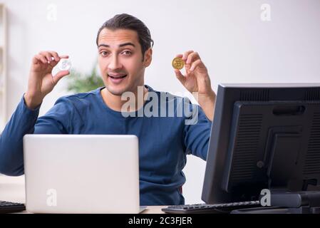 Young male it specialist working in the office Stock Photo