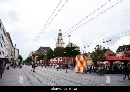 German people and foreign travelers walking travel visit Mannheimer Wasserturm Water tower gardens in Friedrichsplatz square at Mannheim city on Septe Stock Photo