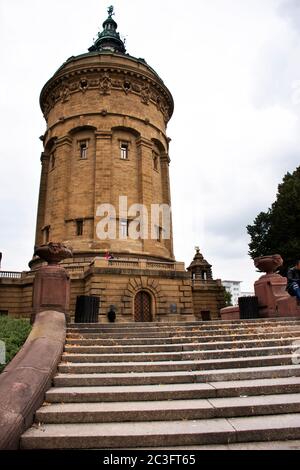 German people and foreign travelers walking travel visit Mannheimer Wasserturm Water tower gardens in Friedrichsplatz square at Mannheim city on Septe Stock Photo