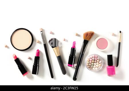 Professional makeup on a white background. Brushes, lipstick and other products, a flat lay with copy space Stock Photo
