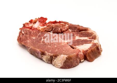 slices of raw pork isolated on white background. Top view. Flattening. Stock Photo