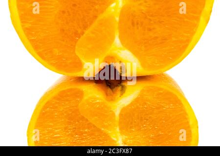 Close-up on a quarter of orange with a reflection on a white background Stock Photo