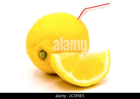 Isolated lemon juice. A whole and a half of lemon with straw, concept of natural fresh fruit juice i Stock Photo