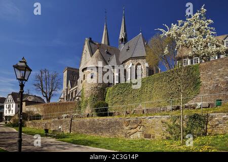 St. Martinus church with city wall and angel tower in spring, Olpe, Sauerland, Germany, Europe Stock Photo