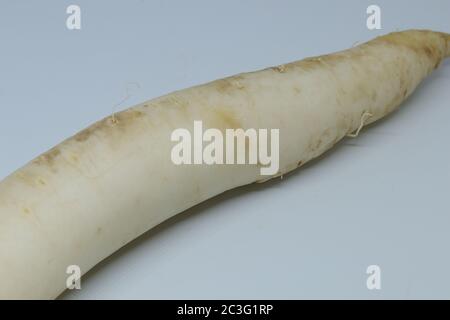 Fresh organic daikon radishes isolated on white background Stock Photo