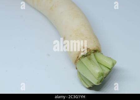 Fresh organic daikon radishes isolated on white background Stock Photo