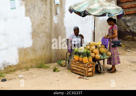 Mombasa, Kenya, Africa-10/01/2017. Pineapple seller on a street Stock Photo