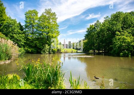 Milan. Italy - May 21, 2019: Pond in Sempione Park (Parco Sempione) in Milan, Italy. Sforza Castle (Castello Sforzesco) on Background. Stock Photo