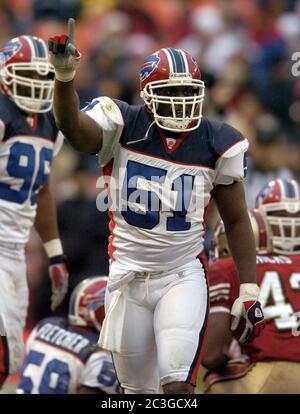 FILE** Buffalo Bills' Takeo Spikes celebrates after intercepting a pass  during the second quarter of a football game against the Chicago Bears in  this Aug. 26, 2005 file photo in Chicago. The