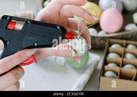 How to make hanging Easter eggs. Step by step, tutorial. Festive decor Stock Photo