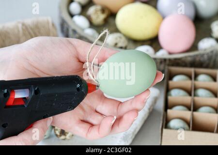 How to make hanging Easter eggs. Step by step, tutorial. Festive decor Stock Photo