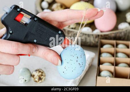 How to make hanging Easter eggs. Step by step, tutorial. Festive decor Stock Photo