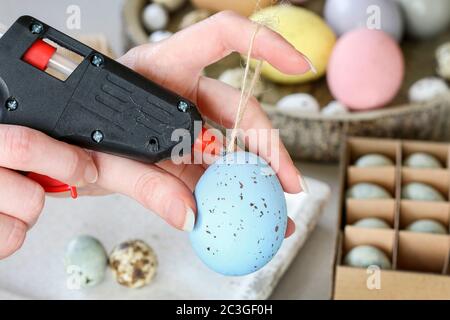 How to make hanging Easter eggs. Step by step, tutorial. Festive decor Stock Photo