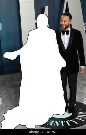 PICTURE QUIZ:  Can you guess the identity if the missing celebrity pictured here alongside her famous musician husband on the red carpet at the 2020 Vanity Fair Oscar Party? ANSWER: Chrissy Teigen  2020 Vanity Fair Oscar Party following the 92nd Oscars at the Wallis Annenberg Center for the Performing Arts in Beverly Hills, California on February 9, 2020.  Featuring: Chrissy Teigen, John Legend Where: Beverly Hills, California, United States When: 10 Feb 2020 Credit: Sheri Determan/WENN.com  Featuring: Chrissy Teigen, John Legend Where: Beverly Hills, California, United States When: 10 Feb 202 Stock Photo