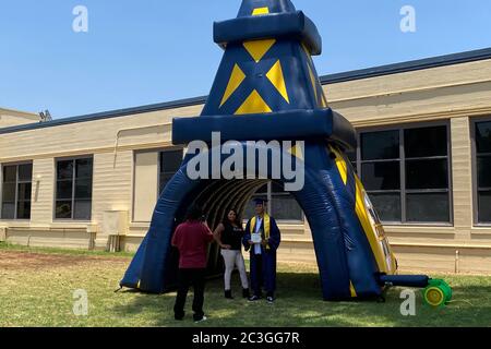 https://l450v.alamy.com/450v/2c3gg7r/montebello-united-states-19th-june-2020-a-male-class-of-2020-graduate-poses-in-cap-and-gown-at-drive-thru-graduation-ceremony-at-montebello-high-school-amid-the-global-coroinavirus-covid-19-pandemic-friday-june-19-2020-in-montebello-calif-photo-via-credit-newscomalamy-live-news-2c3gg7r.jpg